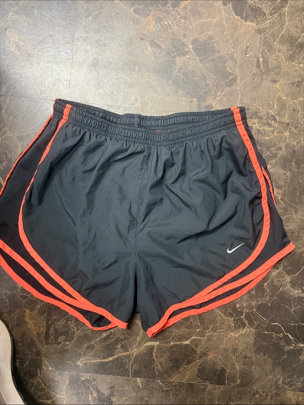 Nike Black Shorts with Red Trim and Swoosh